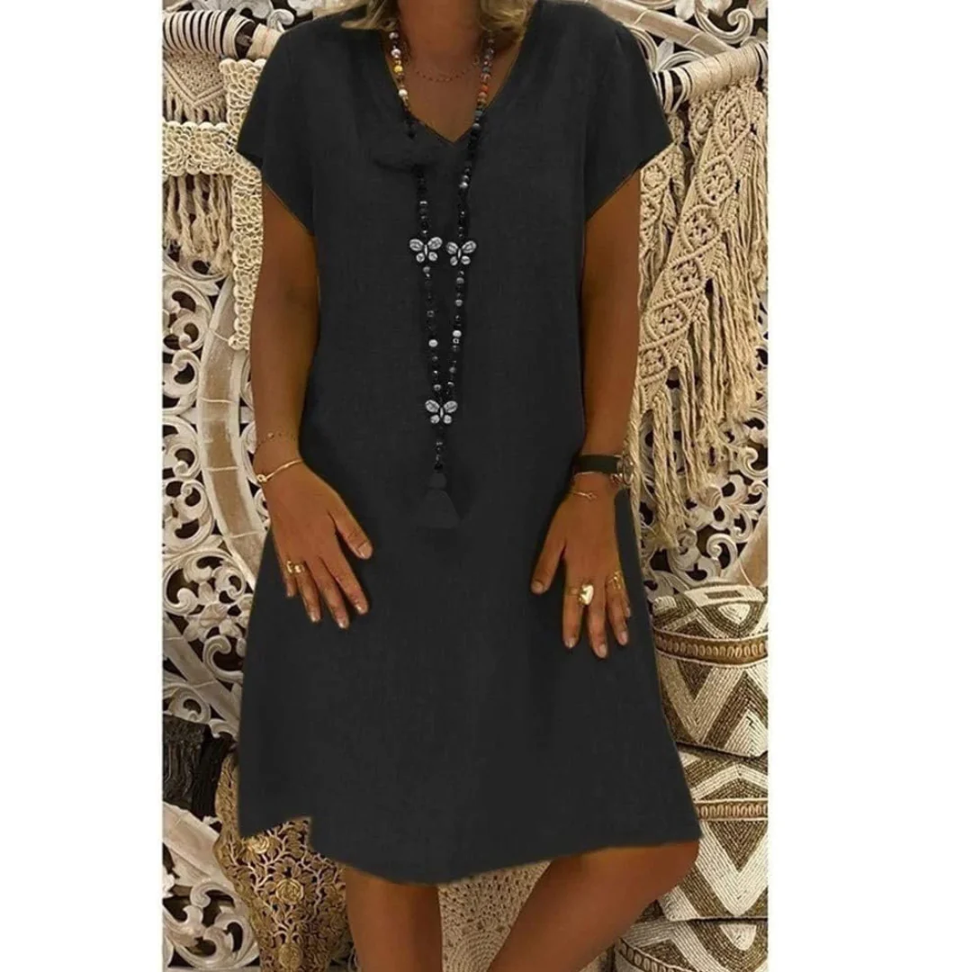 Women's plus size flowy summer day dress, soft comfortable fabric, relaxed fit, multiple colors.