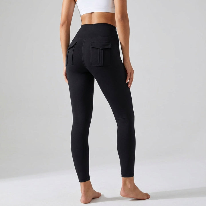 Olivia plus size athletic pants, black sporty leggings with functional pockets, ideal for yoga and fitness.
