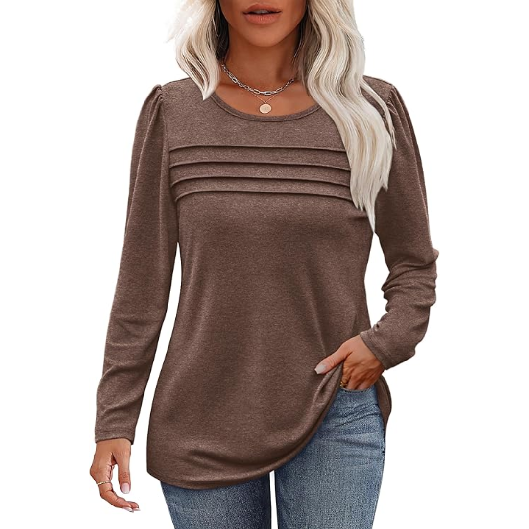 Women's pleated long sleeve tunic top in a vibrant color, ready for a festive outfit