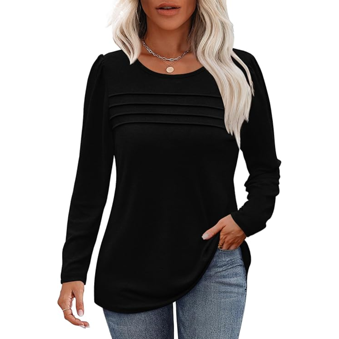Model wearing a women's pleated long sleeve tunic top, demonstrating its elegant flow