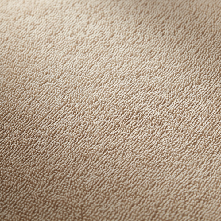 Close-up of a luxurious coral velvet hand towel in blush, showing plush texture and color, part of an 8-piece set