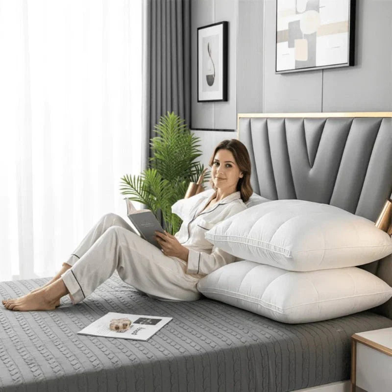 Plush bed pillow offers balanced head & neck support for restful sleep. Hypoallergenic cotton bedding cushion.