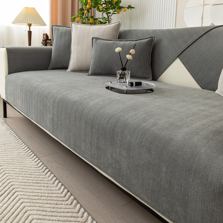 VeluraShield plush chenille herringbone sofa cover & furniture protector. Non-slip and pet friendly.