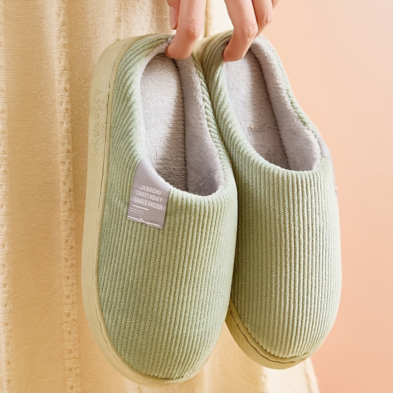 Soft plush women's house slippers, offering cozy warmth and ultimate comfort for relaxing at home.