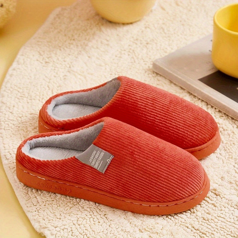 Ultimate comfort women's plush slippers, featuring a soft design for cozy indoor wear and home relaxation.