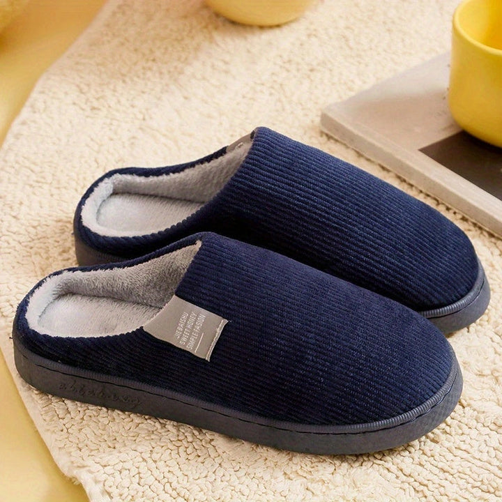 Cozy women's plush comfort slippers, soft indoor house shoes providing ultimate home relaxation and loungewear.