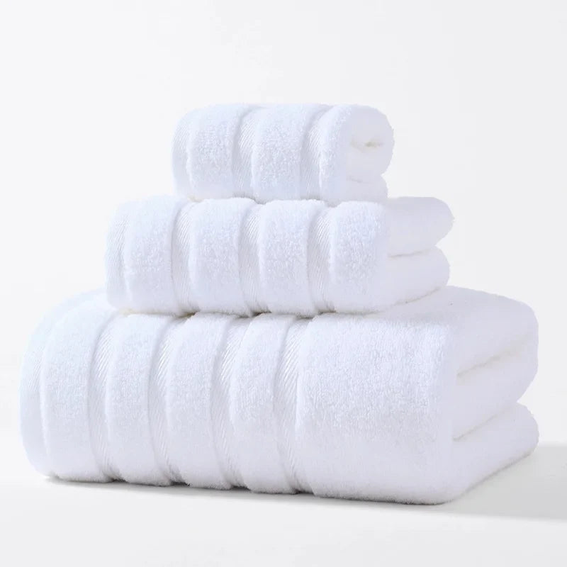 Complete plush cotton bath towel set, soft, absorbent, and quick-drying for any bathroom.