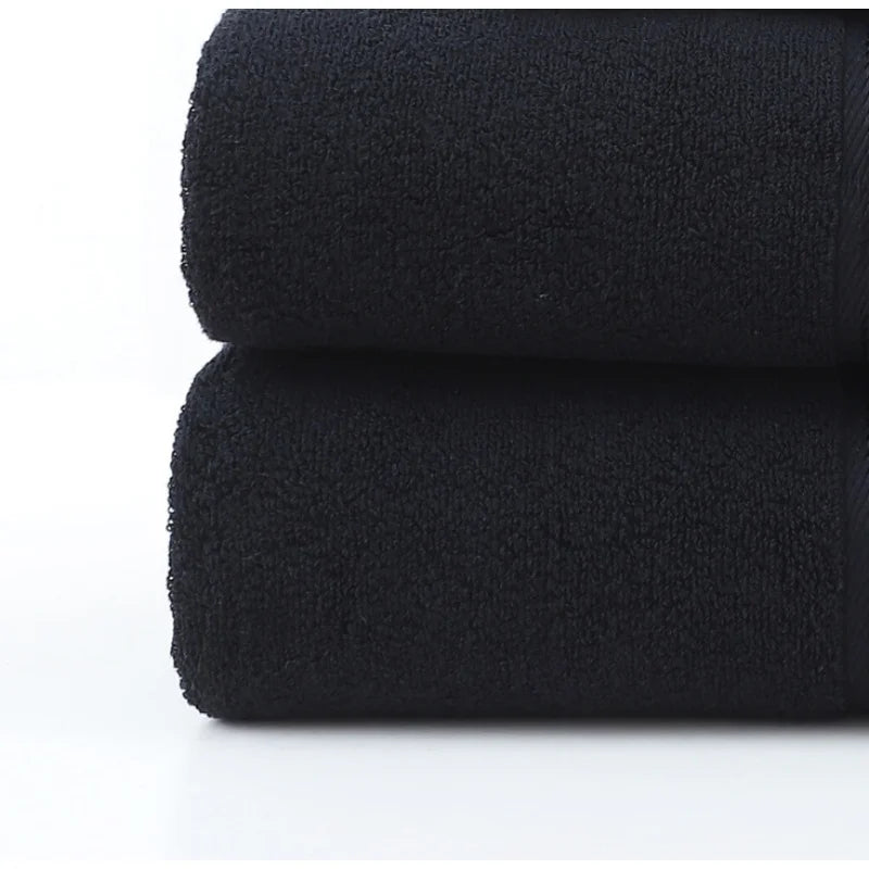 Premium plush cotton bath towel set; durable, soft, and highly absorbent for everyday luxury.