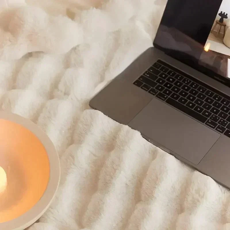 Deluxe faux fur blanket, anti-pilling and incredibly soft, enhancing any home interior with comfort
