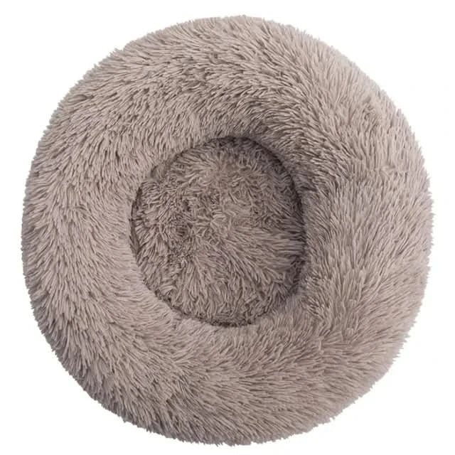 Deep sleep plush dog lounger, anti-anxiety pet bed. Supportive comfort for pets, machine washable, cozy.