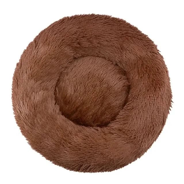 Plush dog lounger with supportive bolster. Calming pet bed for head/neck support, anti-anxiety sleep.