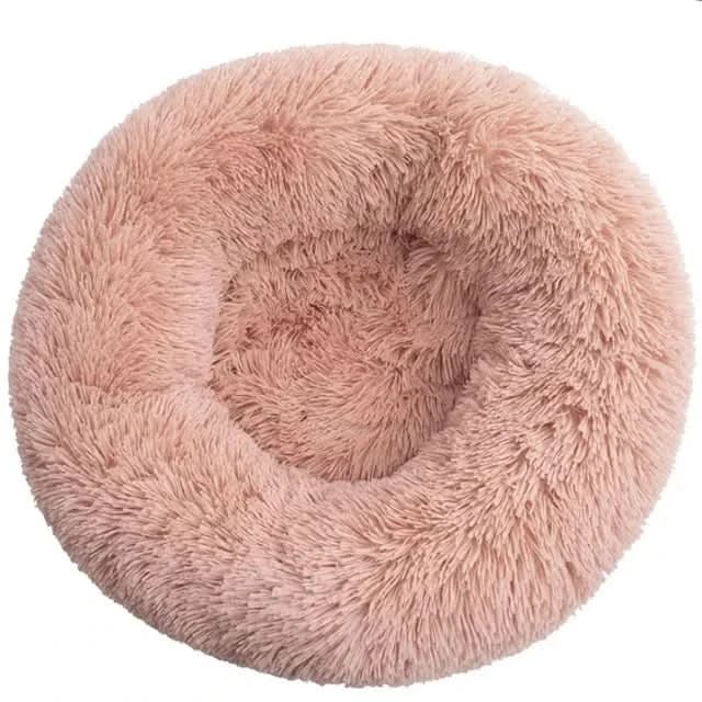 Grey plush dog lounger, calming pet bed for supportive, anxiety-free sleep. Soft & machine washable.