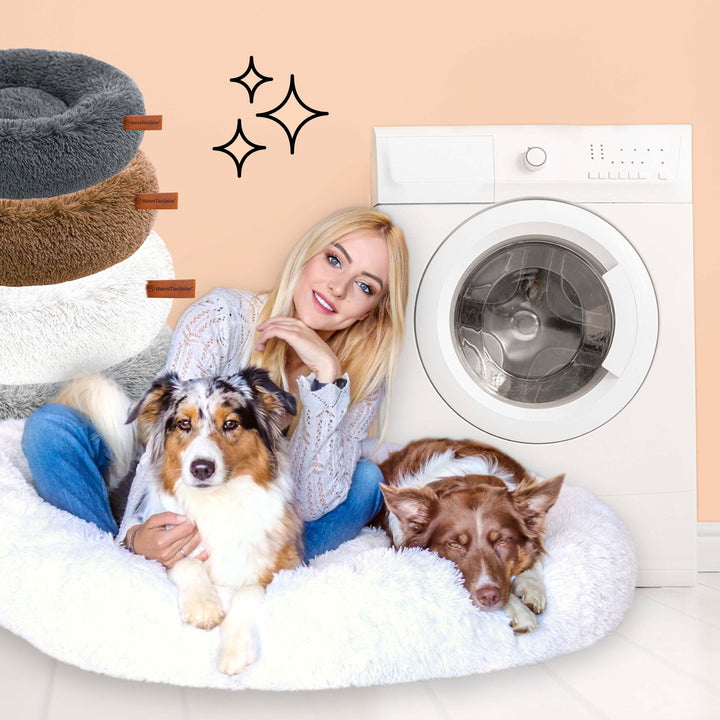Soft, washable plush dog bed in a donut shape, designed for pet anxiety relief and deep sleep