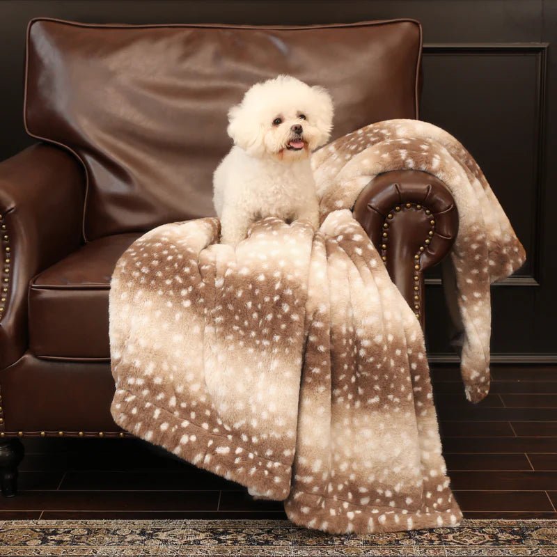 Nature-inspired deer pattern faux fur throw blanket, plush and warm. Ideal for cozy bedroom decor.