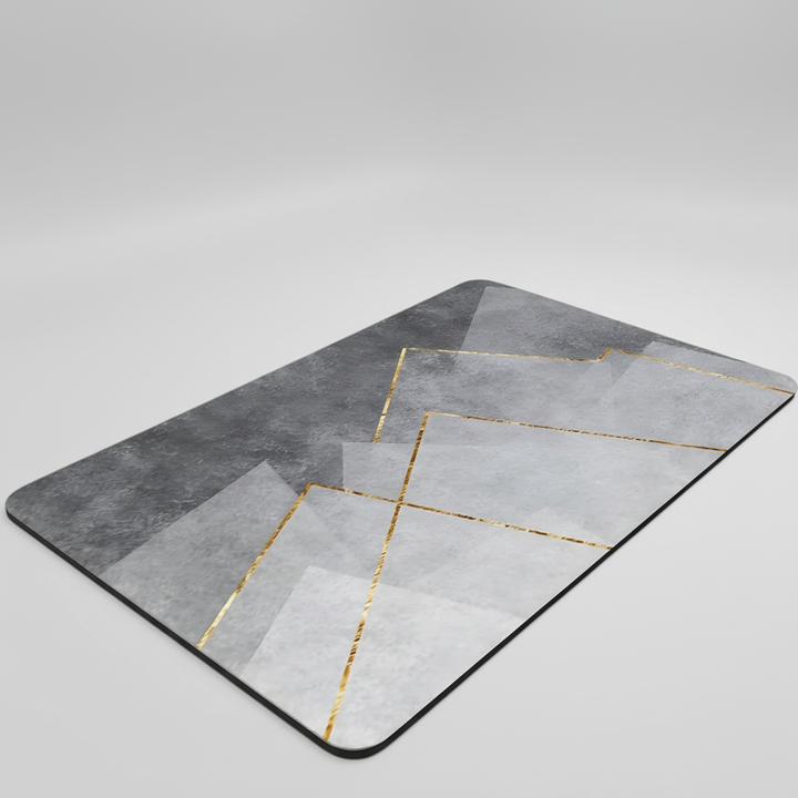 Top-down view of a rectangular, soft anti-slip bath mat, neutral color, blending with various bathroom decors.