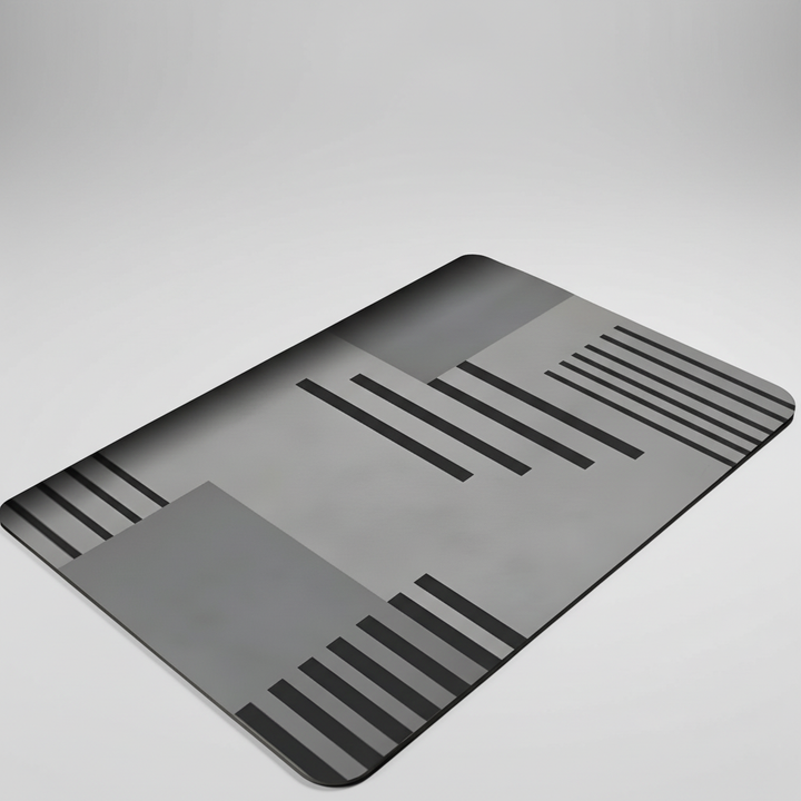 Corner of an anti-slip bath mat on a tile floor, illustrating how it stays firmly in place for bathroom safety.