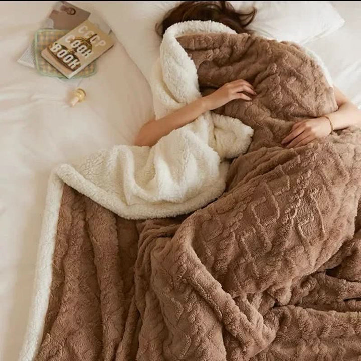 Plush lambswool & microfiber blanket, double-sided for superior warmth & coziness in the bedroom.