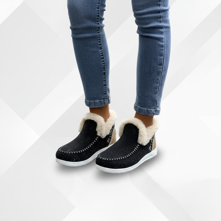 Women's cozy ComfyGlide slippers with soft plush lining and orthopedic support, featuring a non-slip sole.