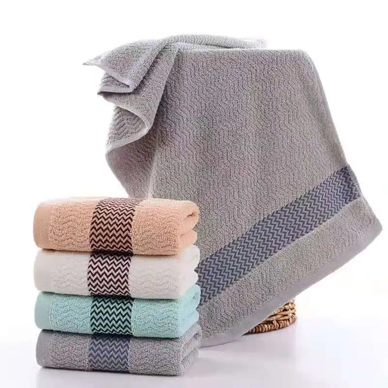 Ultra-soft, plush cotton bathroom towel set, quick-dry & absorbent for luxurious home comfort.