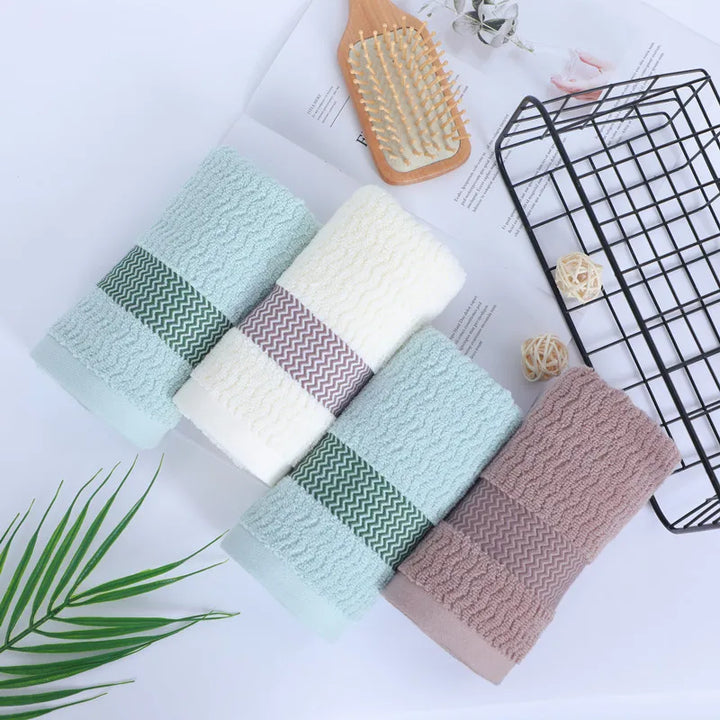 Soft, plush luxury cotton towel set, quick-dry & absorbent, perfect for a spa-like bathroom.