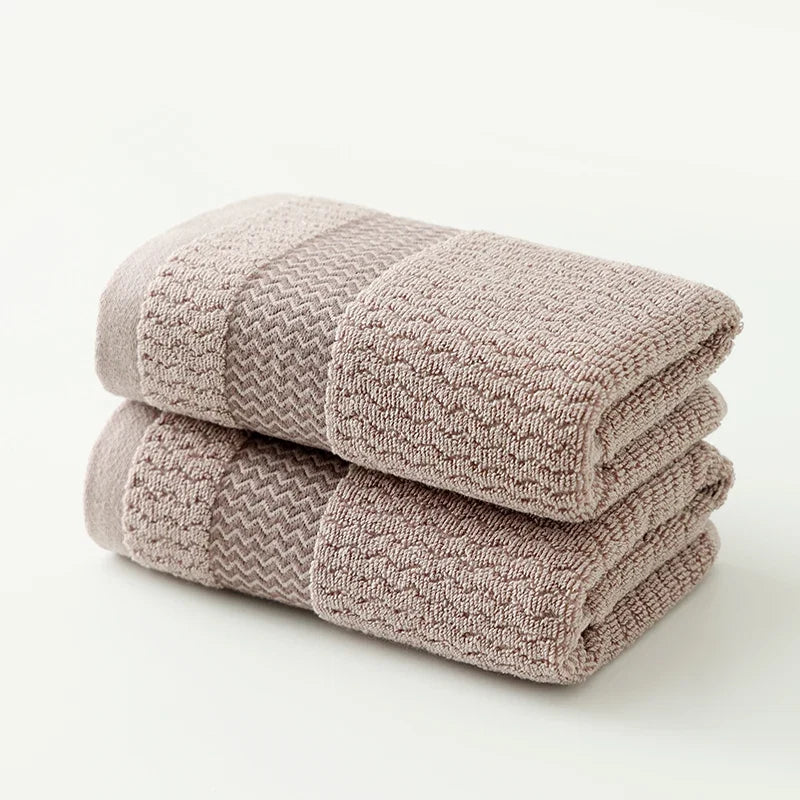 Indulgent soft cotton towel set, plush luxury & quick-dry comfort for your upscale bathroom.