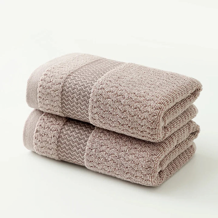 Indulgent soft cotton towel set, plush luxury & quick-dry comfort for your upscale bathroom.