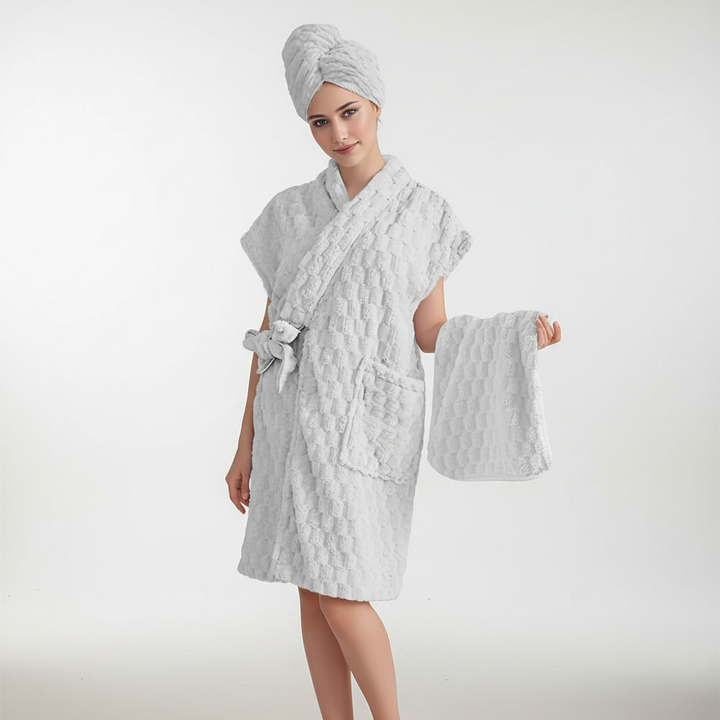 Folded absorbent microfiber towel, part of a luxurious 3-piece women's loungewear and bath set