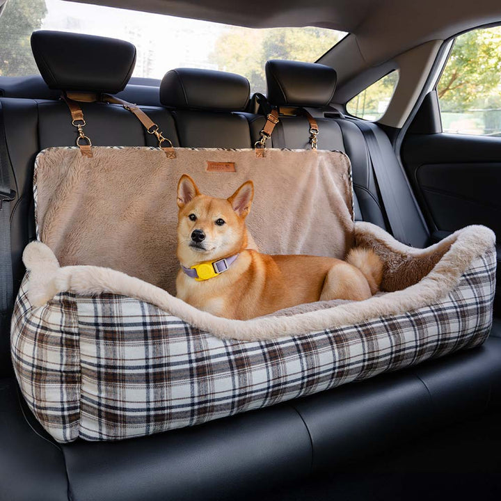 Plush pet car seat for dogs, ensuring secure & comfortable travel. A cozy car bed.