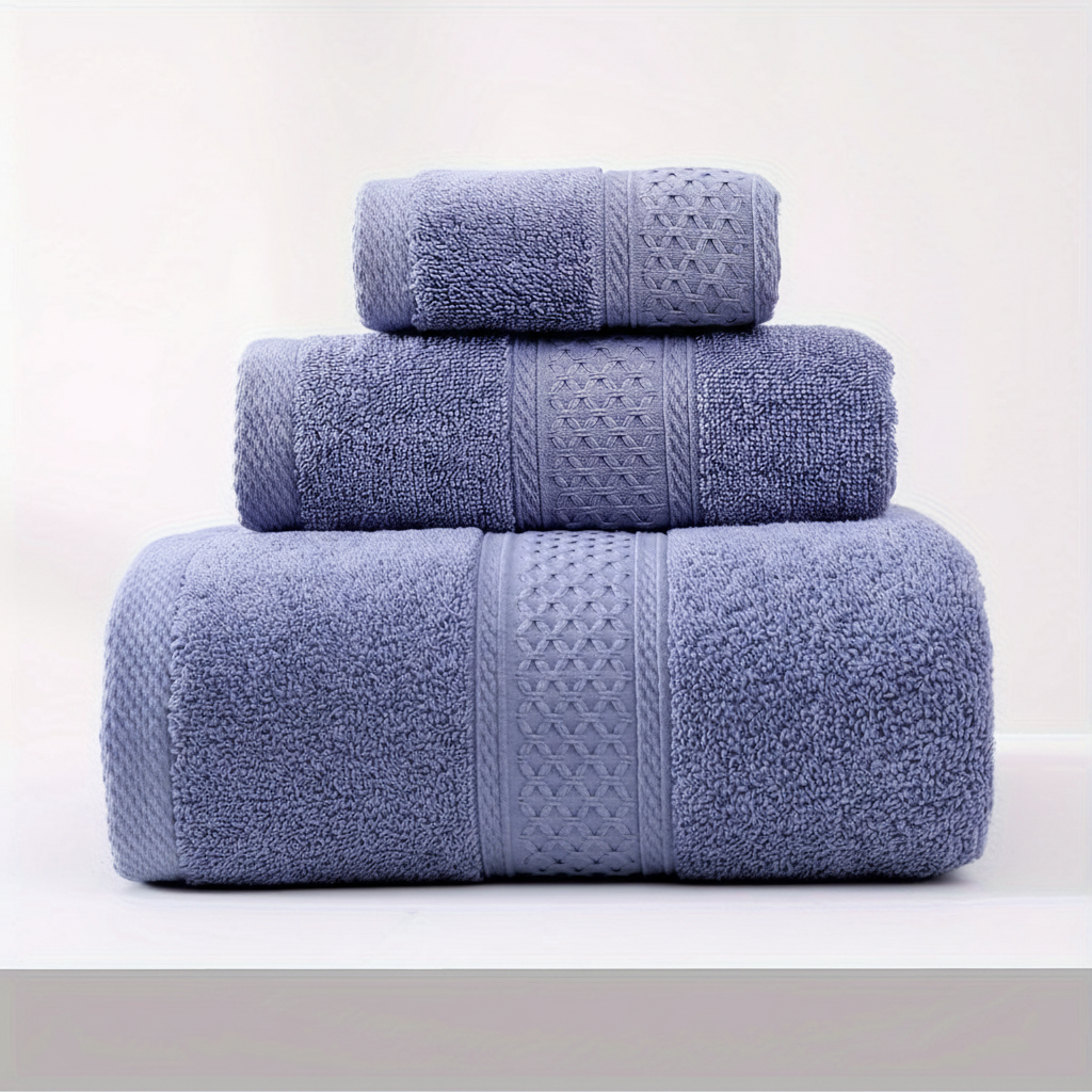 RelaxWrap unisex absorbent cotton bath towel folded neatly on a bed, spa quality at home