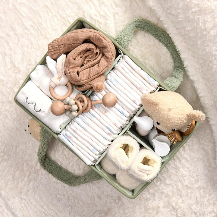 Side view of a beige sherpa diaper caddy with sturdy handles, easy to carry design