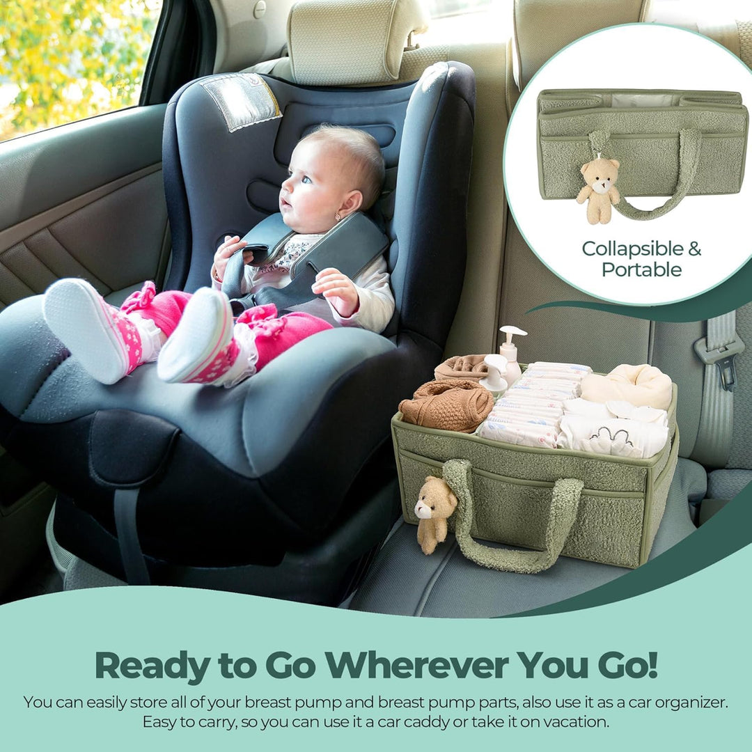 Pink sherpa baby caddy with a pacifier and burp cloth, complete baby essentials storage