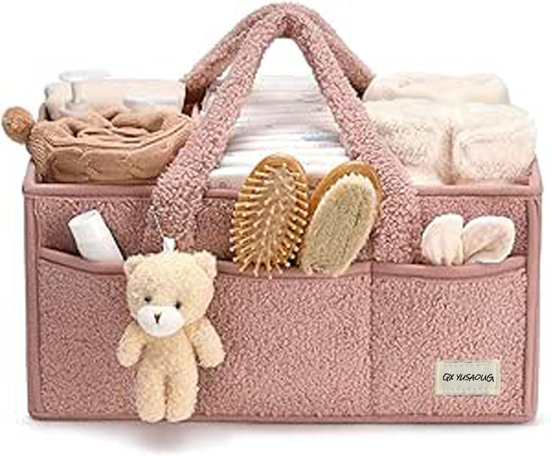 Pink sherpa baby caddy with a travel-sized pack of wipes, great for quick outings