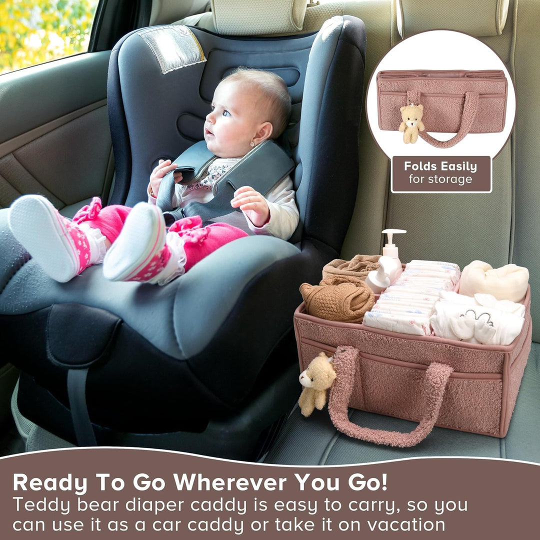 Pink sherpa baby caddy on a dresser, keeping nursery tidy and baby items organized