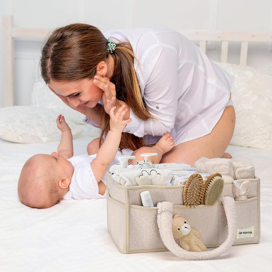 Green sherpa diaper caddy, organized with baby's daily essentials, convenient and neat