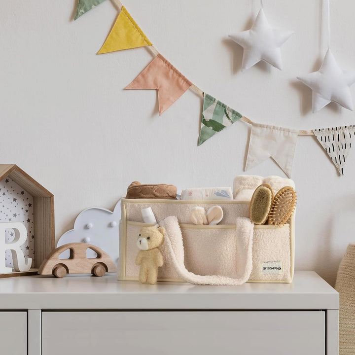 Green sherpa baby caddy, designed for convenience, easily accessible baby items