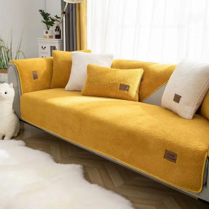 Versatile plush sofa cover for ultimate comfort. Enhances living room decor & provides warmth and protection.