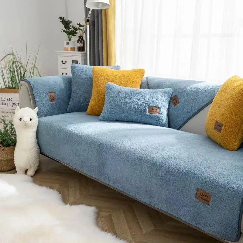 Elegant living room featuring a plush sofa cover. Enhances home decor & provides cozy furniture protection.