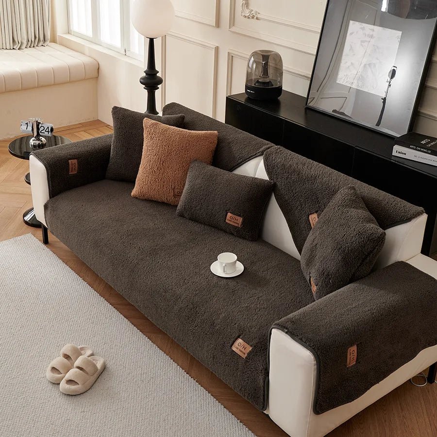 Durable plush couch protector, shields furniture from spills. Easy care sofa cover for lasting home comfort.
