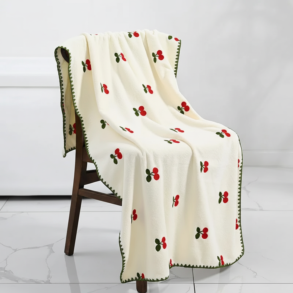 Stack of luxury quick-dry fruit embroidered absorbent bath towels for home decor