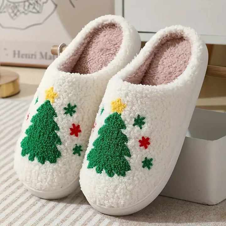 Non-slip winter house slippers with festive deer design. Warm, plush, & cozy indoor footwear for all.