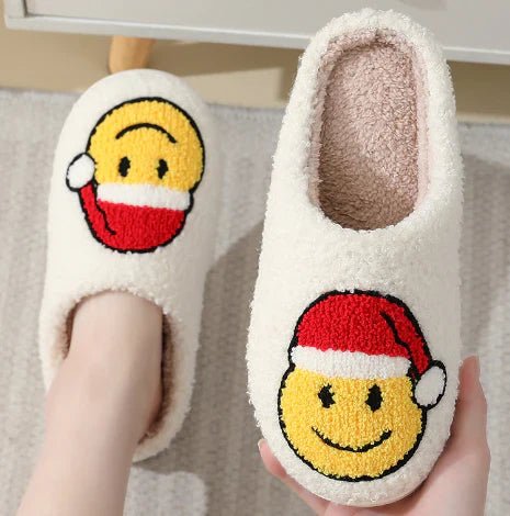 Warm, plush, non-slip unisex house slippers with a festive deer pattern. Comfortable indoor winter footwear.