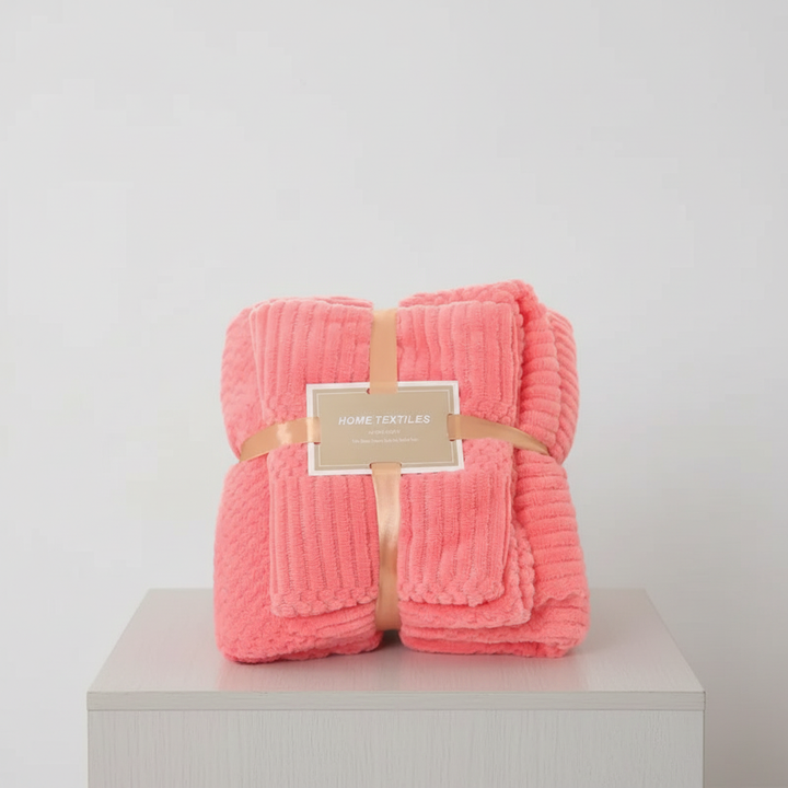 Close-up of the luxurious, soft feel of the velvet 2-piece bath and face towel set, high absorbency