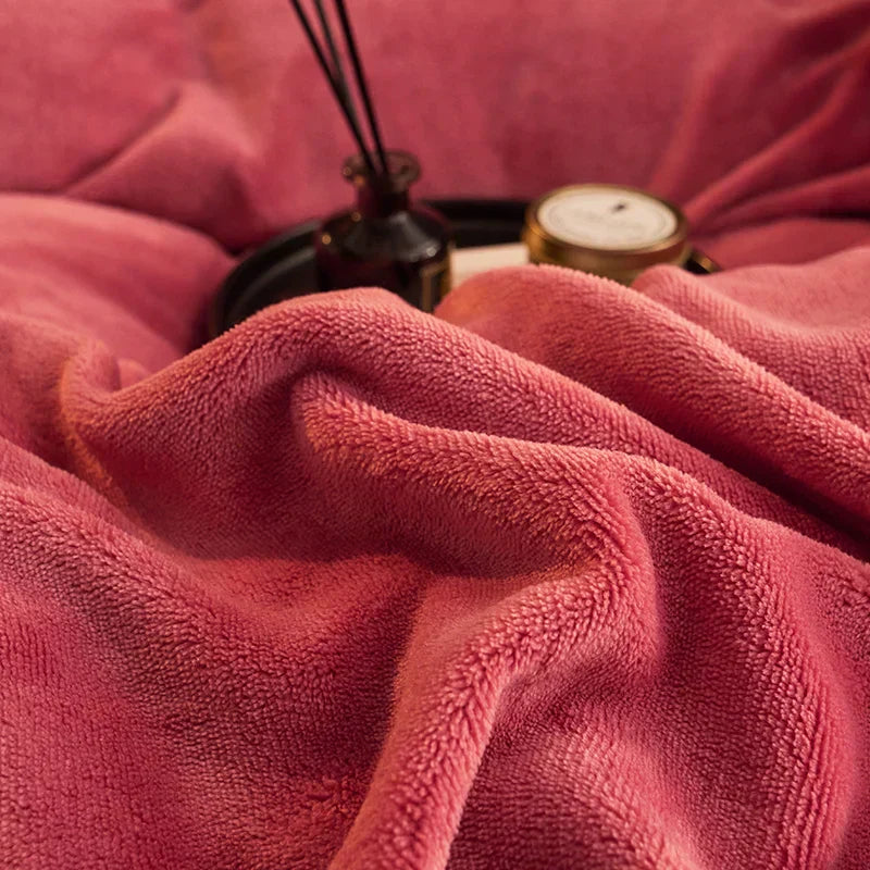 Top-down view of a bed featuring a velvet fleece duvet cover set, showcasing its plush and inviting texture.