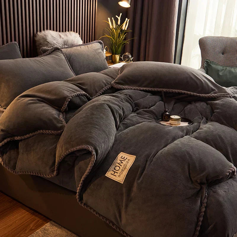 Stack of folded velvet fleece duvet covers in various colors, emphasizing the soft, plush feel for winter bedding.