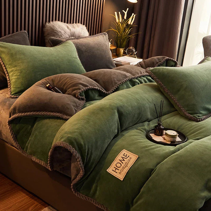 A cozy bed with a grey velvet fleece duvet cover set, ideal for snuggling up during cold winter nights.