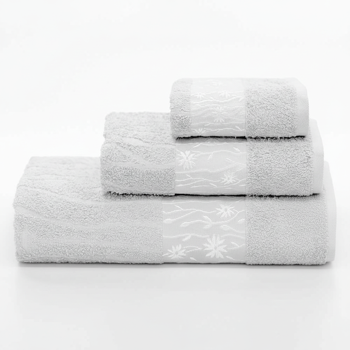 Full view of the complete 3-piece cotton towel set, including bath sheet, hand towel, and washcloth