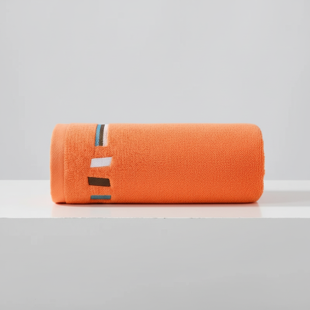 Unisex luxury cotton towel set in a folded display, highlighting its softness and high absorbency.
