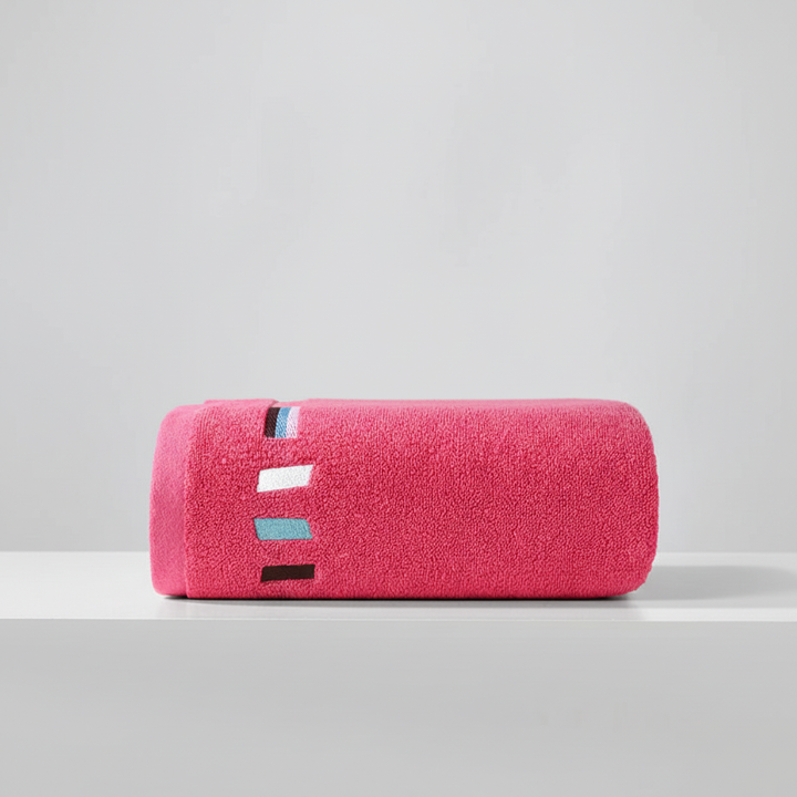 Absorbent and soft cotton towel set, displayed to show its generous size and premium quality.