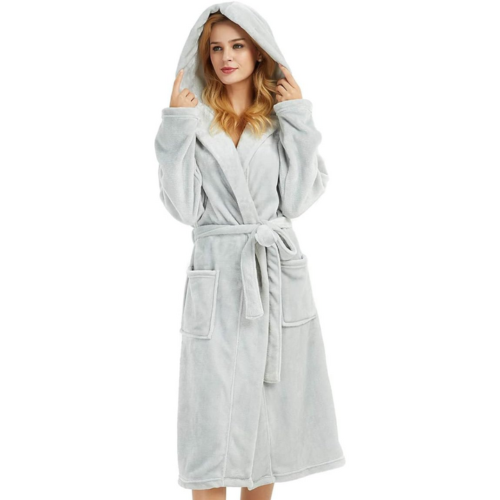 Full-length women's hooded fleece bathrobe, providing warmth and softness, great for winter nights.