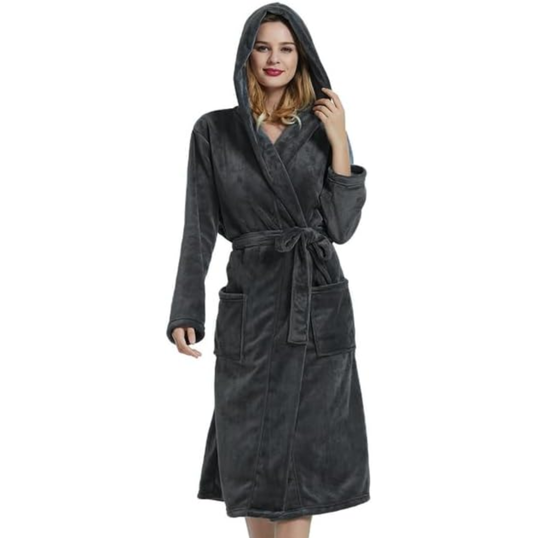Side view of a woman wearing a soft grey fleece hooded bathrobe, showcasing its relaxed fit.
